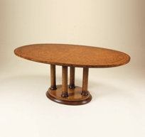 Amber Nouveau Finished Elm Burl and Satinwood Veneer Oval Dining Table, Four Column Base