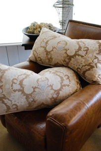 beige,blue and white pillow