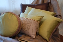 pink and pale green beaded pillows