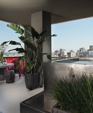 Stainlesssteelspawithbenchseatingthree-sidedskirtbackpanelwaterfeature_medium_cropped